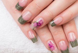 Purple flower with glittery French tips.