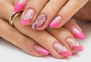 A row of diamond with pink nail tips.